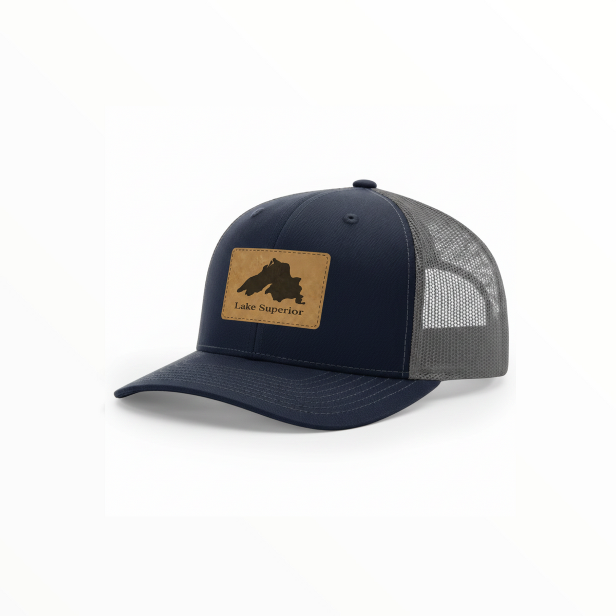 Navy trucker hat with charcoal mesh and tan Lake Superior patch.