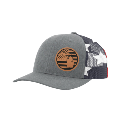 Gray trucker hat with circular Michigan patch and black-and-white star print side panel