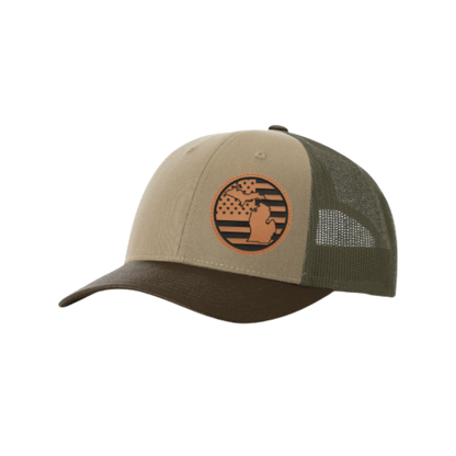 Trucker hat with round Michigan patch, tan front and dark olive mesh back.