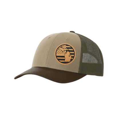 Trucker hat with round Michigan patch, tan front, dark brown mesh back.