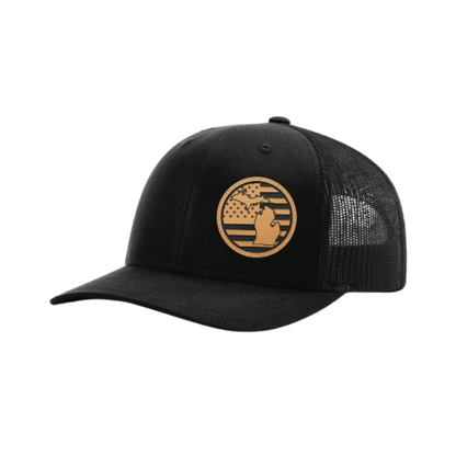 Trucker hat with round Michigan patch, black front and black mesh back.