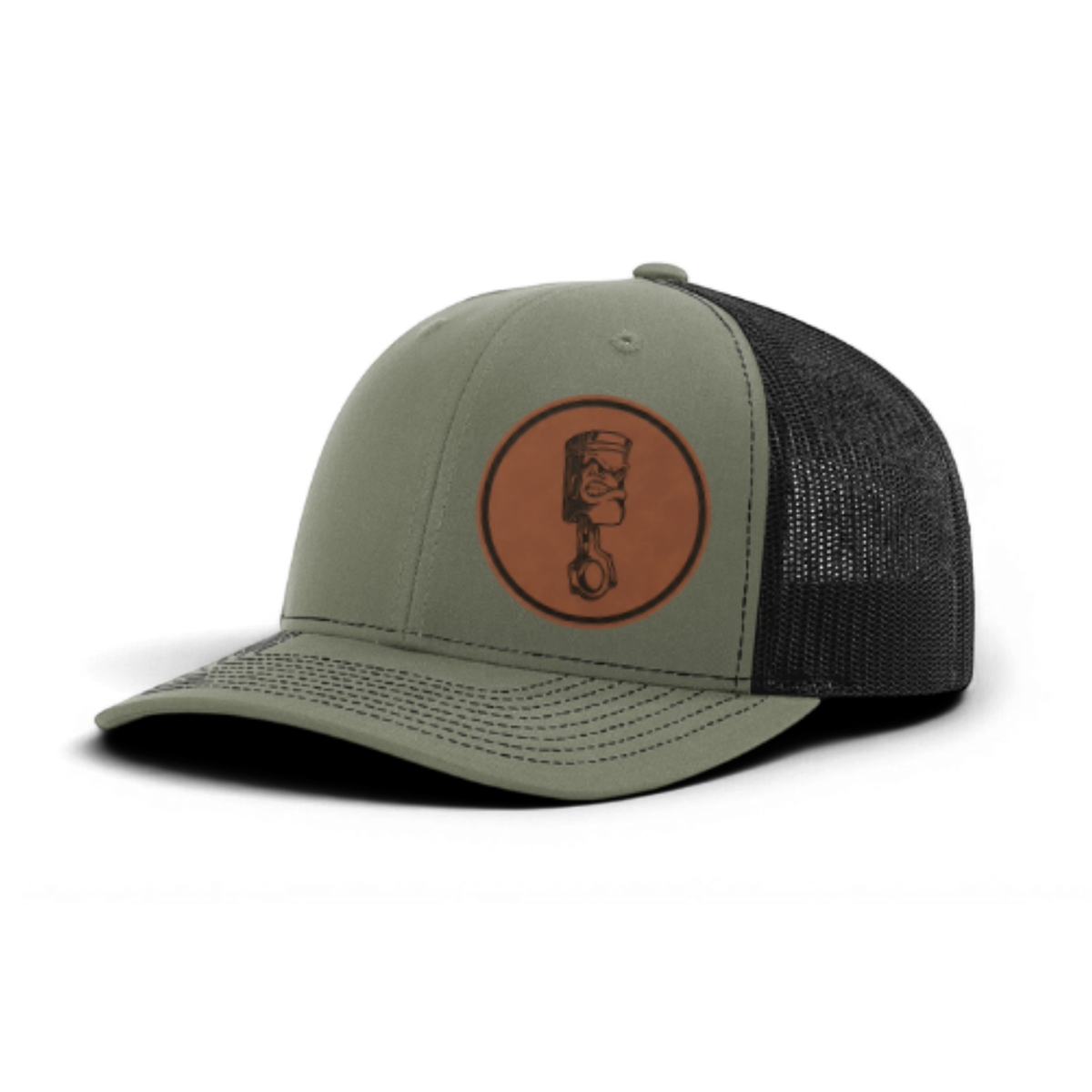 Green trucker cap with circular piston patch and black textured mesh panels