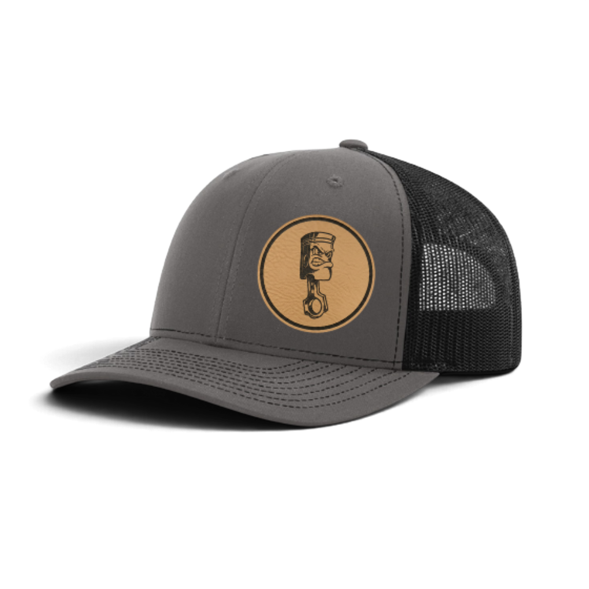 Gray trucker cap with circular piston patch and black textured mesh side
