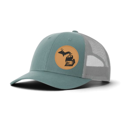 Teal trucker cap with gray mesh and tan fishing patch