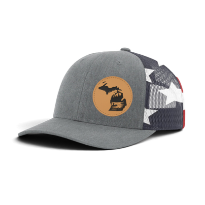 Gray trucker hat with circular fish patch; black mesh with white star print on side panel