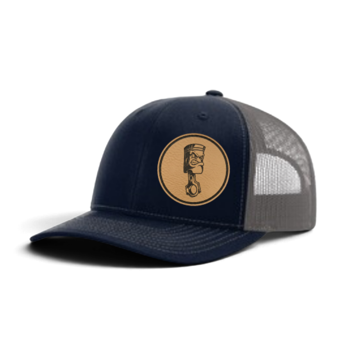 Navy trucker cap with circular piston patch and gray mesh side panels