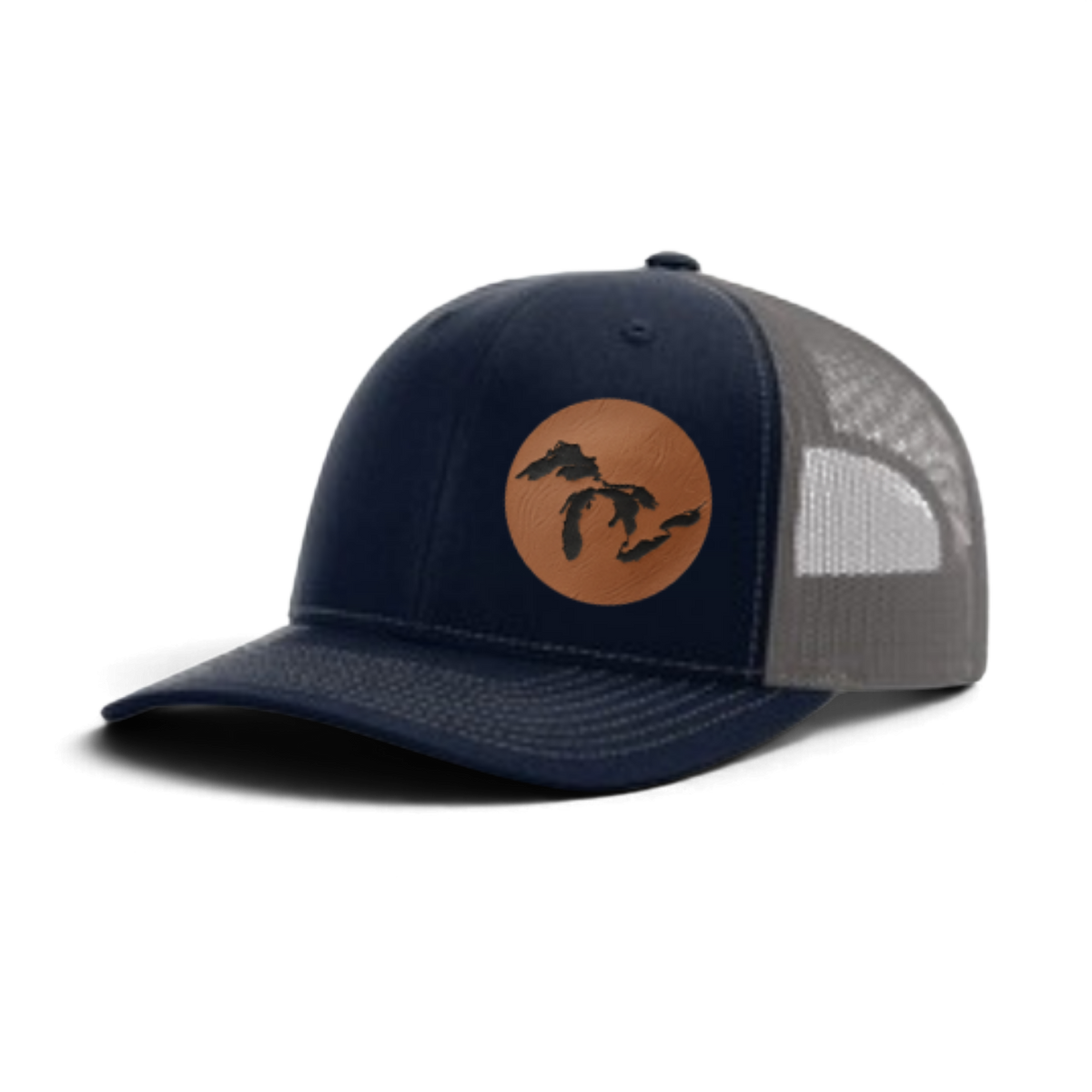 Navy trucker hat with tan patch and black silhouette; light gray mesh back panel
