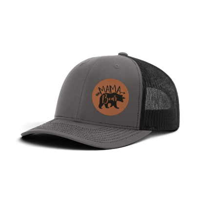Gray trucker hat with dark mesh and brown “MAMA Bear” patch.