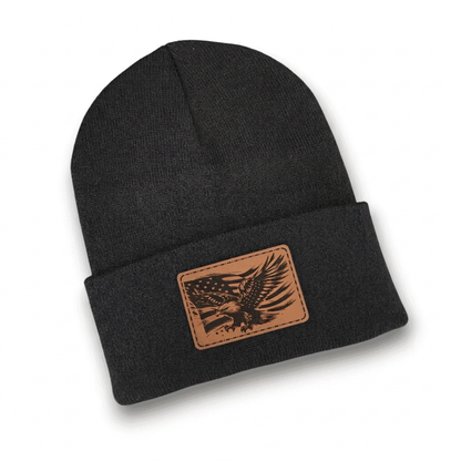 Black knit beanie with rectangular leather-look eagle patch