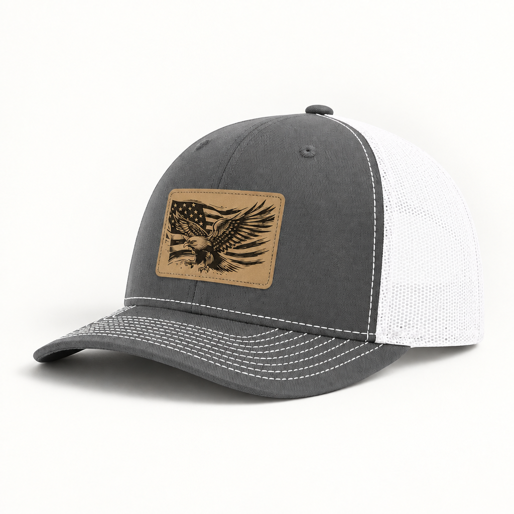 Gray and white mesh trucker hat with American flag eagle patch, curved brim