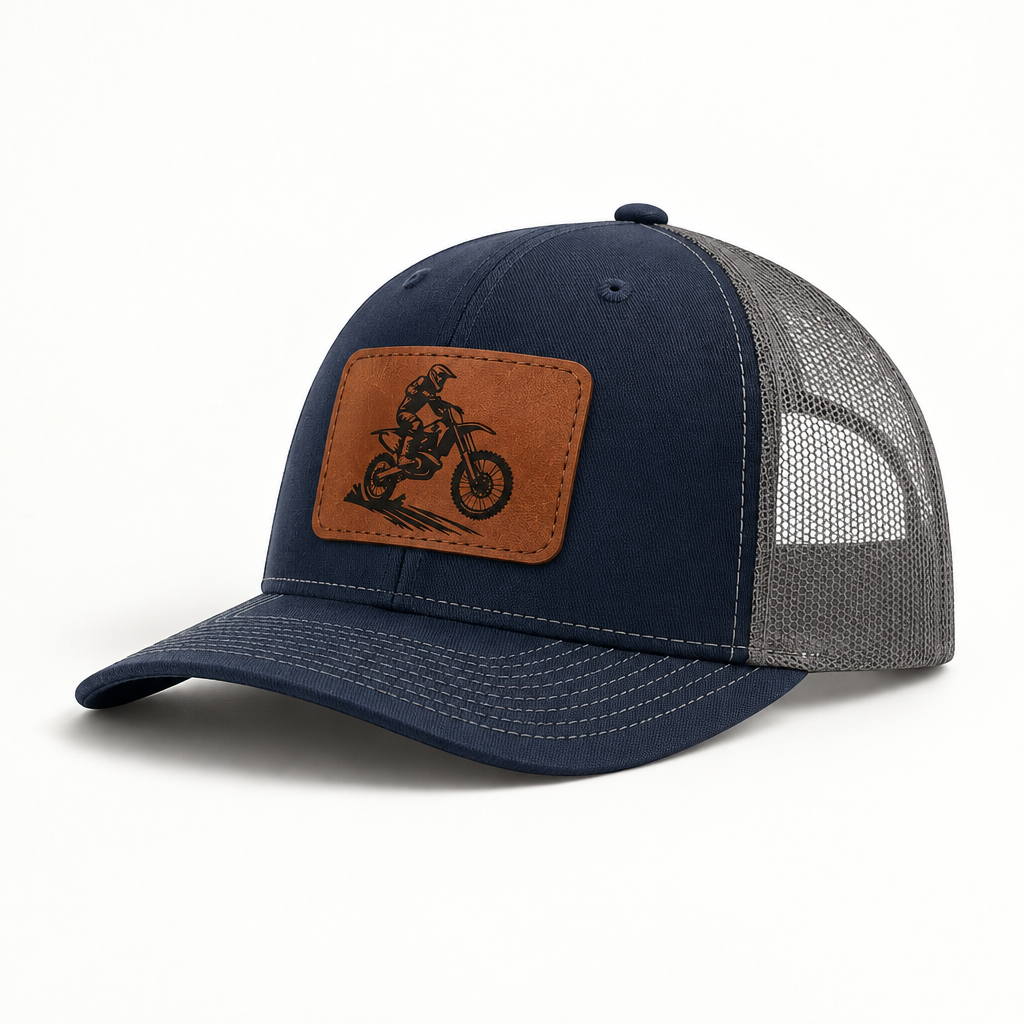 Navy trucker hat with brown dirt bike patch and gray mesh side panels