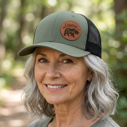 Olive trucker hat with circular patch and black mesh back