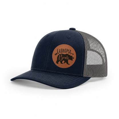 Navy trucker hat with Grandma Bear round patch and light-gray mesh side panels