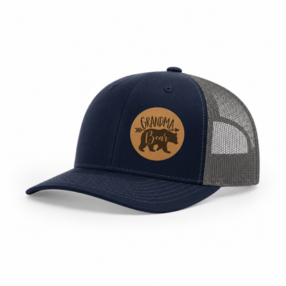 Navy trucker hat with Grandma Bear round patch and gray mesh side panels