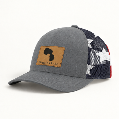 Trucker hat with tan patch, gray front and black mesh with star panel