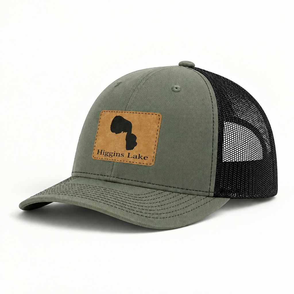 Trucker hat with tan patch, olive-green front and black mesh back, curved brim