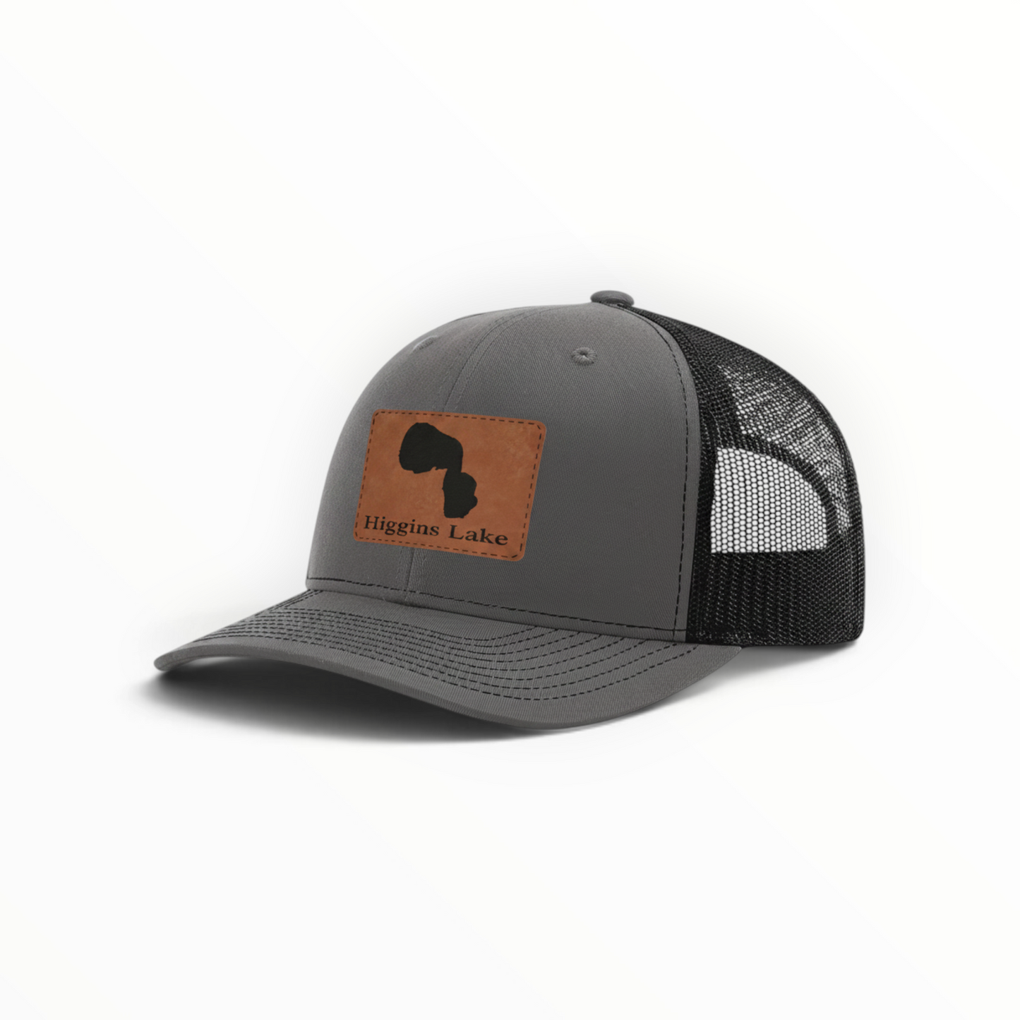 Trucker hat with brown Higgins Lake patch, gray front and black mesh back.