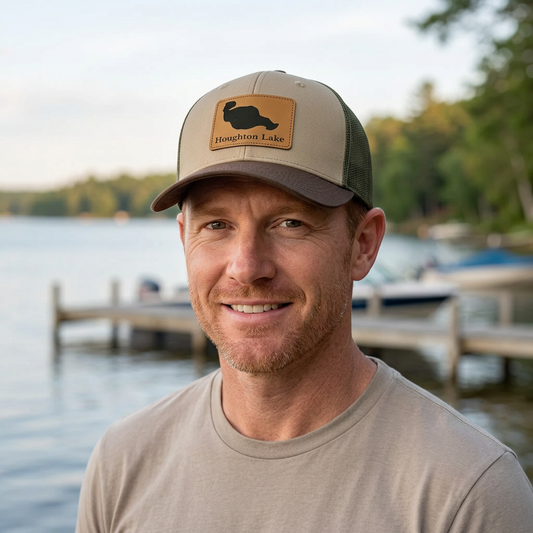 Two-tone trucker hat with Houghton Lake patch, tan front and green mesh back