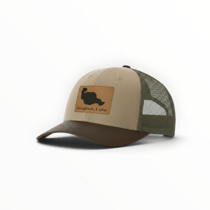 Beige trucker cap with olive mesh back, tan patch with Houghton Lake silhouette