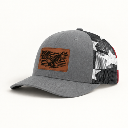 Grey trucker hat with eagle American flag patch and black-and-white star mesh sides