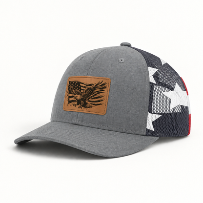 Grey trucker hat with eagle American flag patch and black-and-white star mesh sides