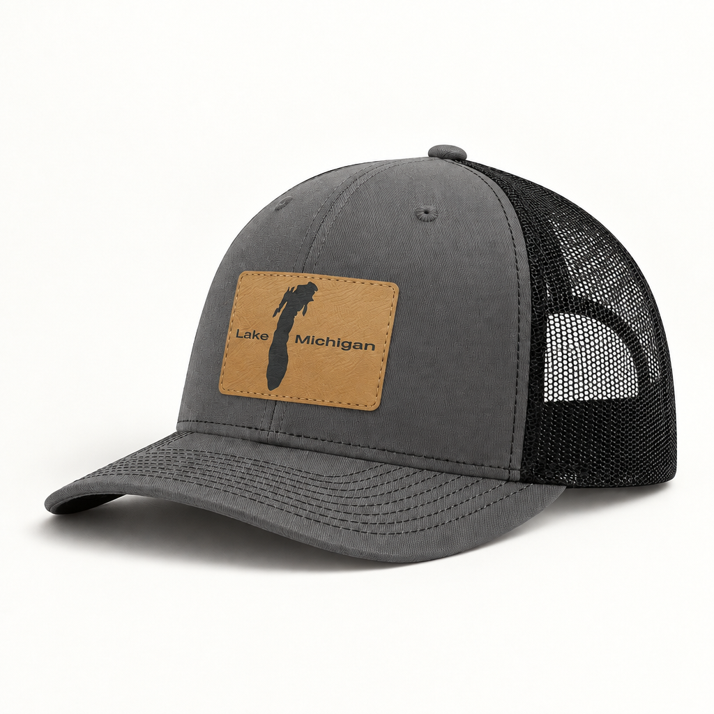 Dark gray trucker hat with black mesh back and rectangular Lake Michigan patch