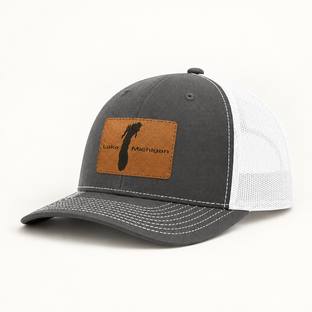 Dark gray trucker hat with white mesh back and rectangular Lake Michigan patch