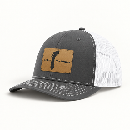 Dark gray trucker hat with white mesh back and rectangular Lake Michigan patch