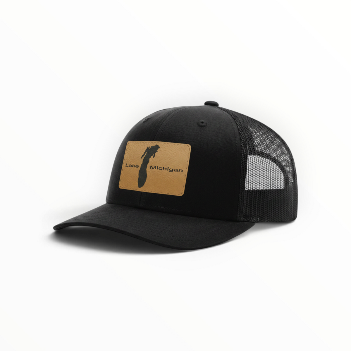 Black trucker cap with black mesh and brown Lake Michigan front patch