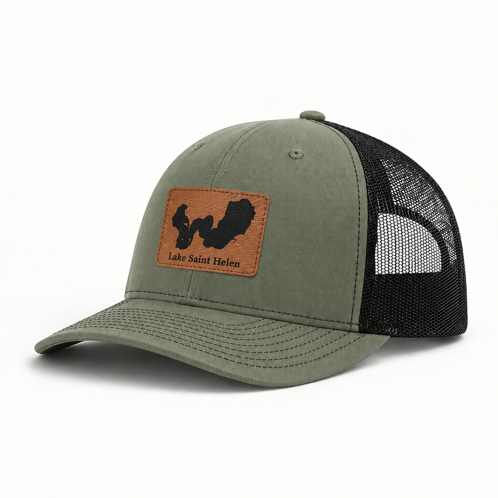 Olive green trucker hat with tan logo patch, black mesh back, curved brim, snap button