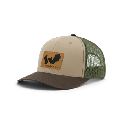 Beige trucker hat with dark green mesh and tan patch featuring Lake Saint Helen logo