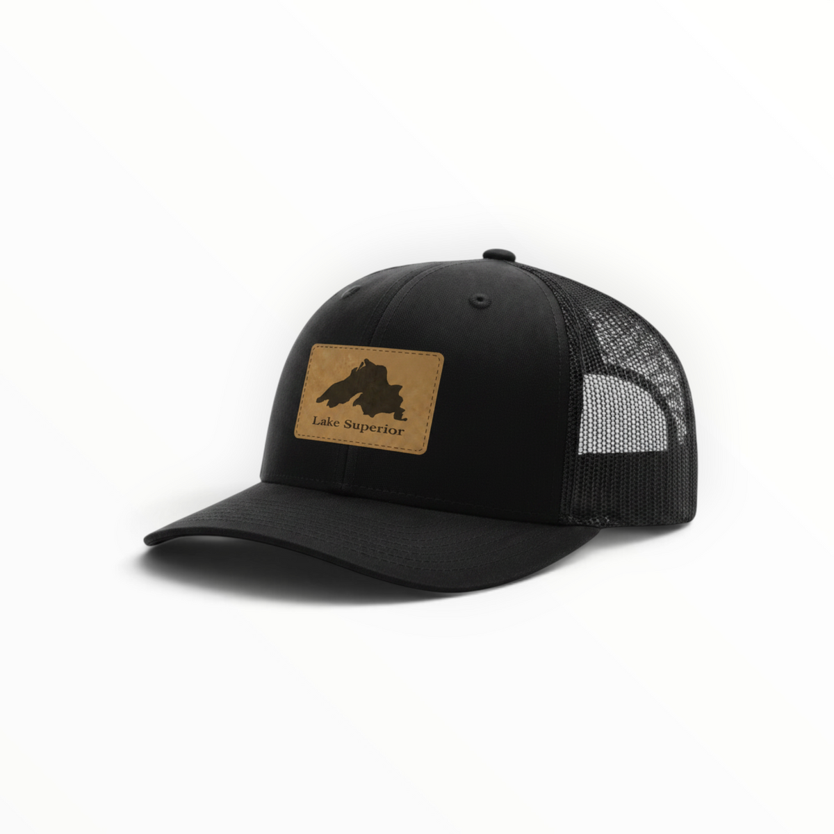 Black trucker hat with Lake Superior leather patch and mesh side panels