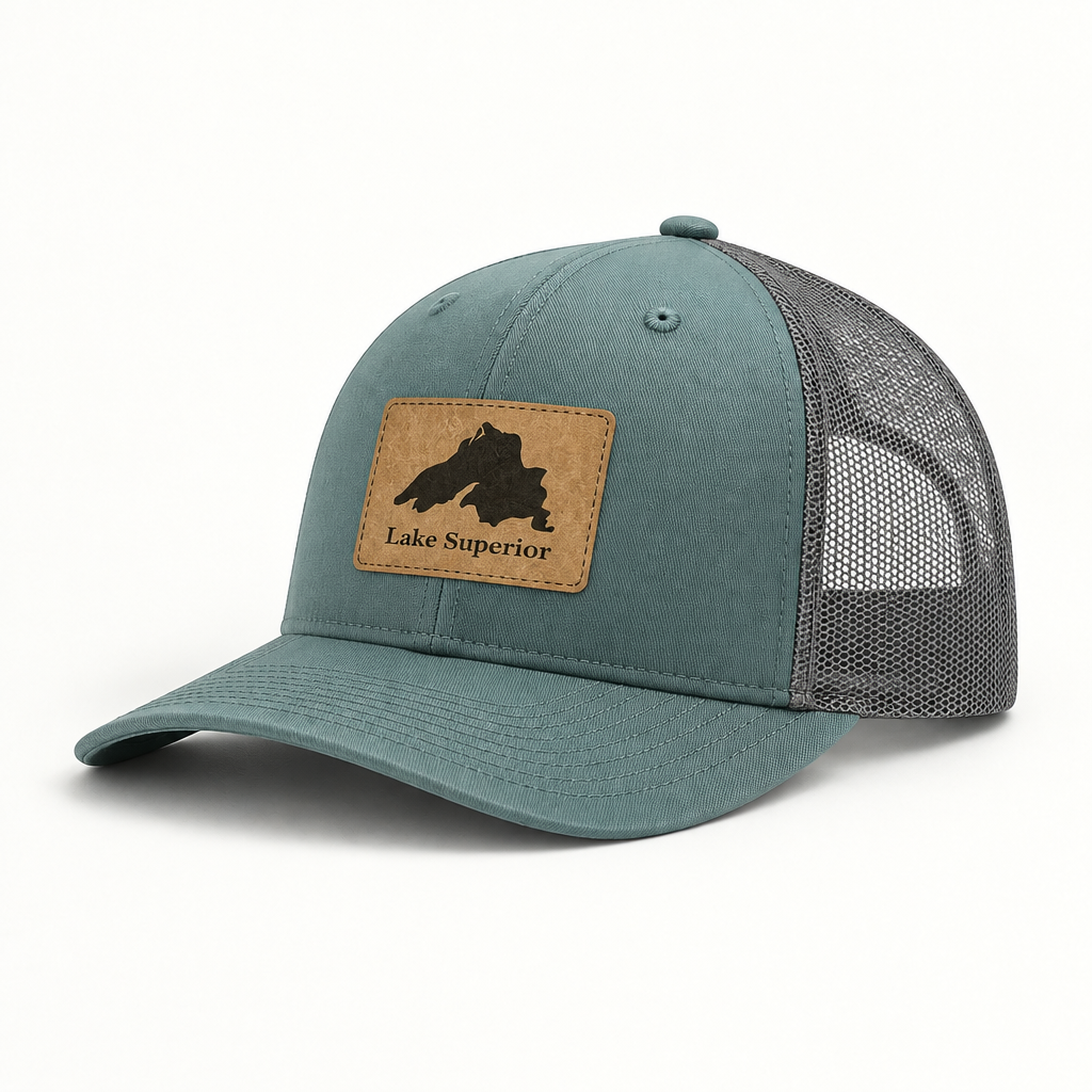 Lake Superior patch trucker hat with teal crown and gray mesh sides