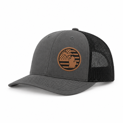 Charcoal trucker hat with Michigan patch; black mesh side panel