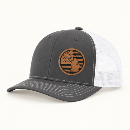 Dark gray trucker hat with Michigan patch; white mesh side window