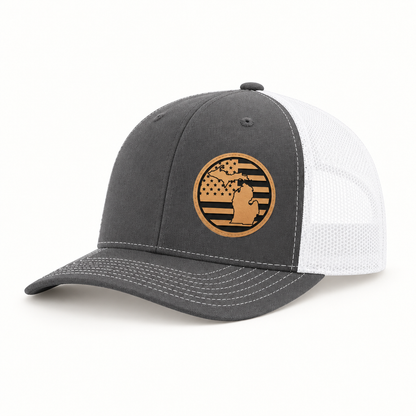 Dark gray trucker hat with round Michigan patch; white mesh back