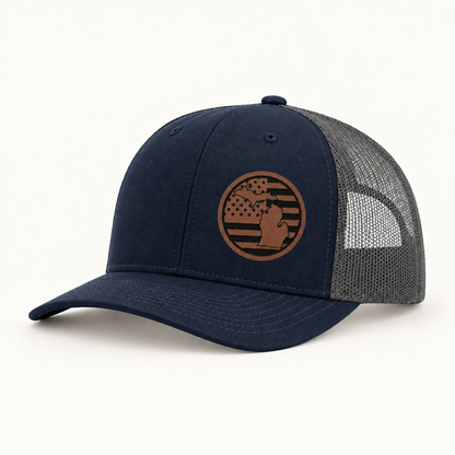 Navy trucker hat with Michigan patch; gray mesh back panel