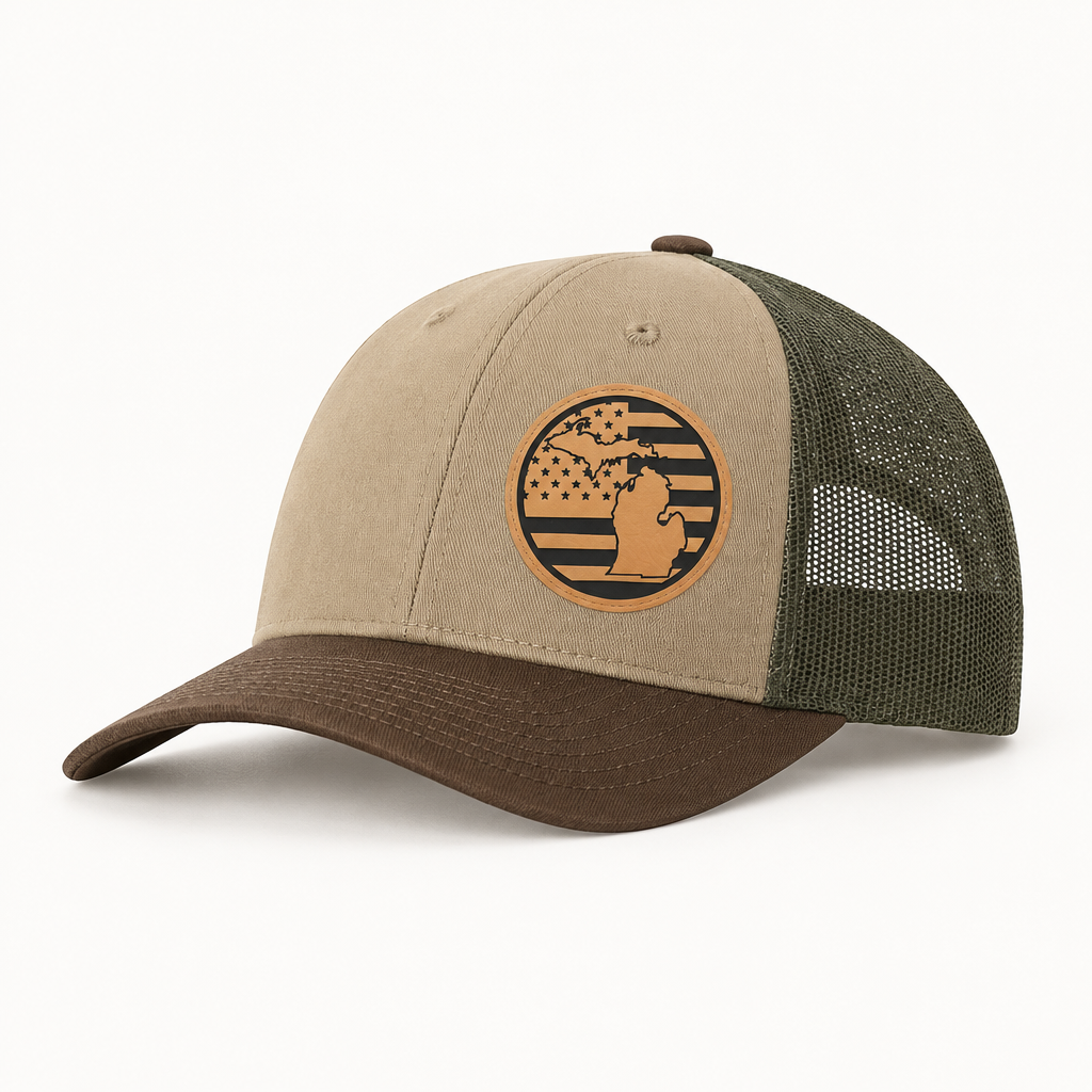 Beige trucker hat with tan Michigan American-flag patch and dark olive mesh back