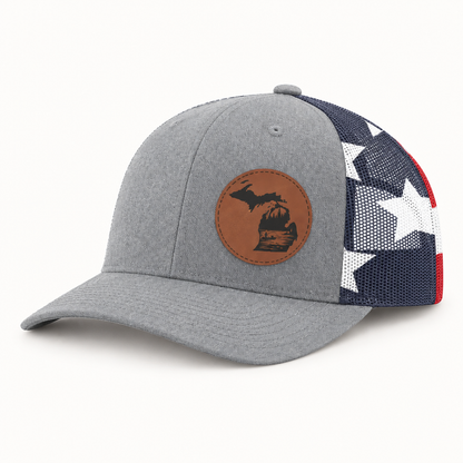 Gray trucker hat with tan fishing patch and black-and-white checkered mesh side panel