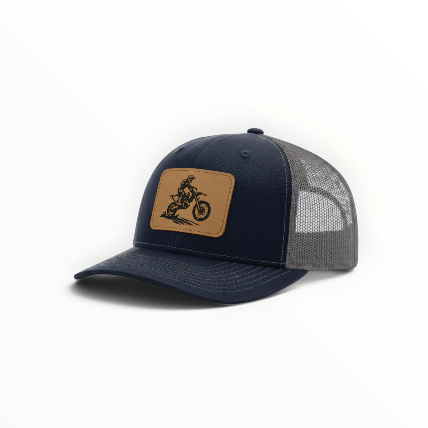 Navy trucker hat with dirt bike patch, dark mesh side panel