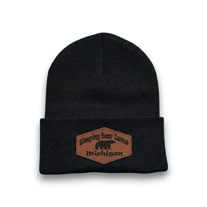 Black knit beanie with Sleeping Bear Dunes Michigan logo patch
