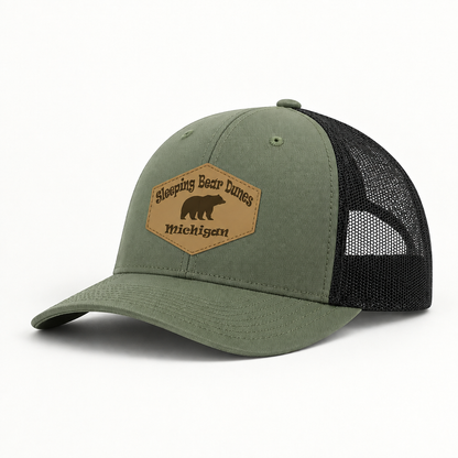 Olive green trucker hat with black mesh sides and tan Sleeping Bear Dunes Michigan patch