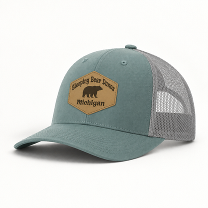 Teal trucker hat with gray mesh sides and tan Sleeping Bear Dunes Michigan patch